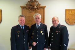 Stadtbrandmeister Peter Schmidt, Günter Stöfer und Ortsbrandmeister Jürgen Barkfrede (von links).