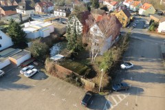 16.02.2016 - Die Grundstücke Lindhooper Straße 50, 48 sowie die Tankstelle (Nr. 46) vom Hof der Feuerwehr aus.