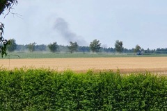 Weithin sichtbare Rauchsäule des Brandes, aufgenommen aus Armsen.